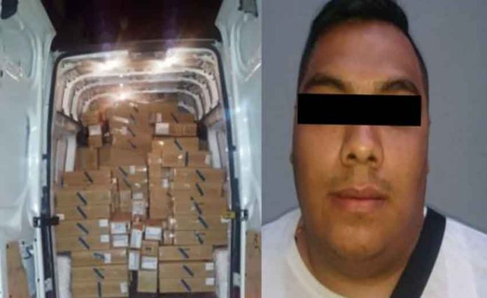 Boxes of iPhones in the van and the suspect.