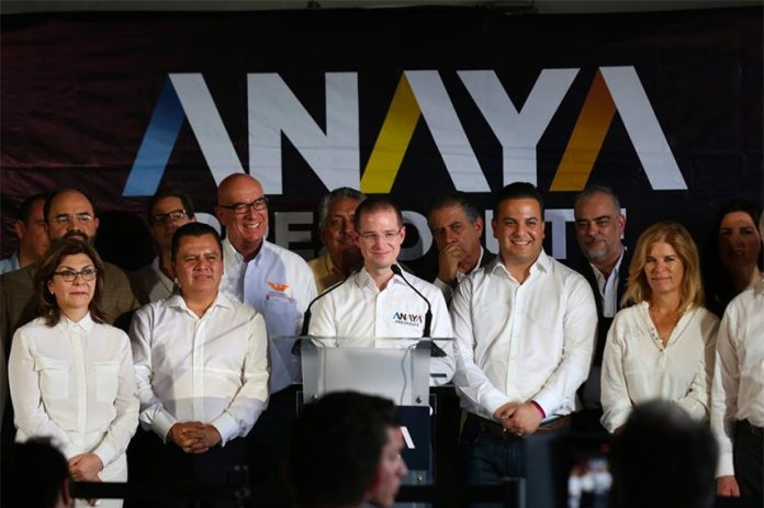 Coalition members closed ranks around candidate Anaya, center.
