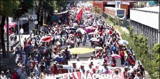 Protesting teachers march in Mexico City.