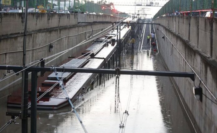 Rail cars under water yesterday in Guadalajara