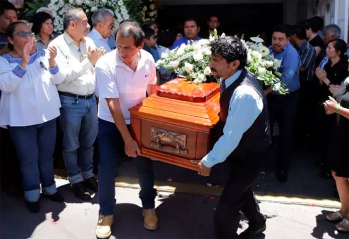 One of many recent funerals for Mexican politicians.