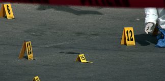 A homicide investigation, an all-too-common sight.