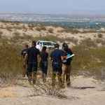 Investigators at one of many crime scenes in Juárez.