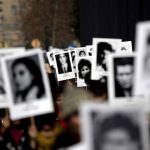 A demonstration by relatives displaying photos of missing family members.