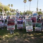 Posters tell the stories of the missing in Nuevo Laredo, describing them as 'victims of the navy.'