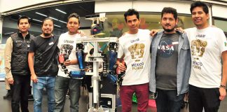 UNAM students and their robot, Justina.