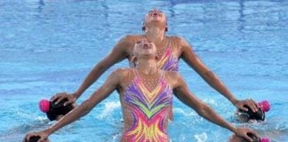 The medal-winning swimmers at one of their events in Greece.