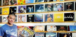 Domene with a collectible Beatles album.