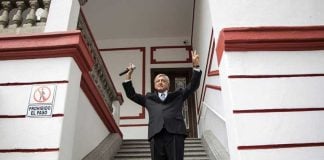 López Obrador speaks to reporters outside his transition headquarters in Mexico City.