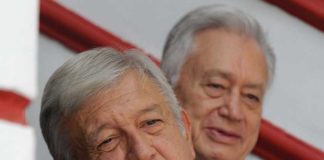 López Obrador announces plans for the energy sector. Behind him is his nominee to head the Federal Electricity Commission, Manuel Bartlett.