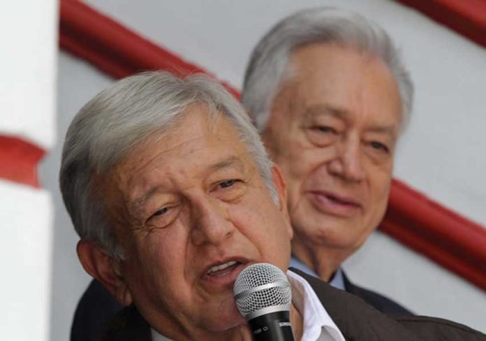 López Obrador announces plans for the energy sector. Behind him is his nominee to head the Federal Electricity Commission, Manuel Bartlett.
