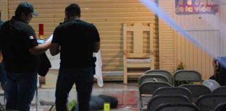 Investigators at the crime scene in Ciudad Obregón.