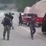 What appears to be a cartel convoy lined up on a highway in Mexico.