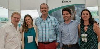 Fox, center, with Khiron executives.