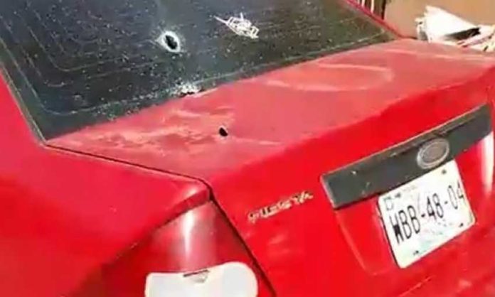 One of 11 vehicles damaged by gunfire in Guaymas.