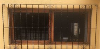 Security bars on a Mexican home. Unlike those in the story, these are mounted outside the frame.