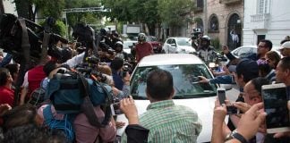 The crowded street outside Morena headquarters.