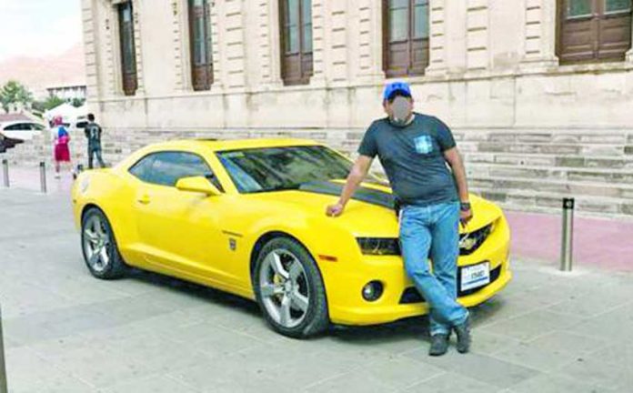 The suspect and one of his luxury vehicles.