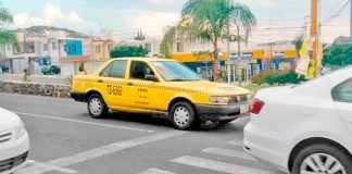 A taxi in Querétaro: they may still be yellow but they'll be green too.