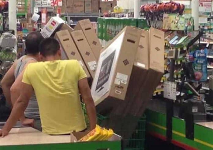 A shopping cart can hold a lot of televisions.