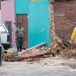 Bodies are recovered from a hidden grave at an abandoned house in Guadalajara.