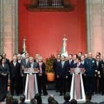 On the left, López Obrador and the incoming cabinet and on the right, Peña Nieto and the outgoing department heads.