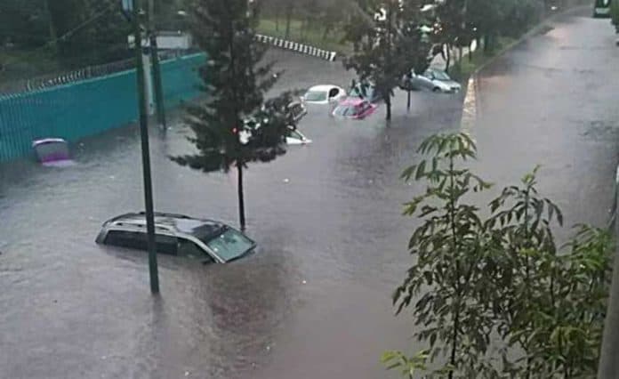 Submerged vehicles in Mexico City yesterday.