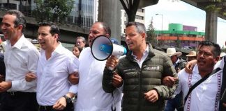 Governor Murat speaks during a march by mezcal makers in Mexico City yesterday.