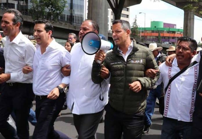Governor Murat speaks during a march by mezcal makers in Mexico City yesterday.