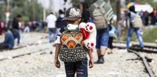 A young migrant, northward bound.