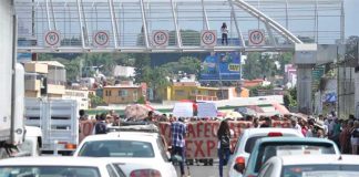 Neighbors halted traffic on the Paso Express in May to protest problems caused deficiencies in its construction.