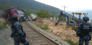 Police guard the scene of a train robbery.