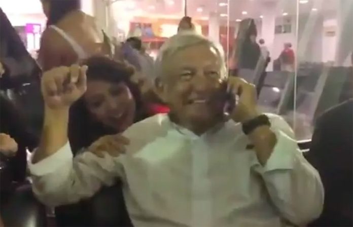 AMLO relaxes in the airport in Ciudad Obregón on Saturday.