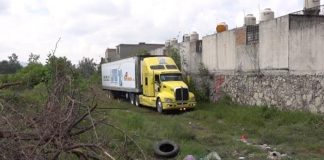 The smelly semi containing the unwelcome cargo.