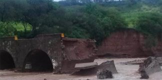 Oaxaca bridge washed out by heavy rains.