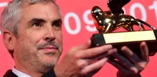 Cuarón and his Venice Film Festival award.