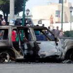 Lynch mob also burned the vehicle in which the two victims had been traveling.