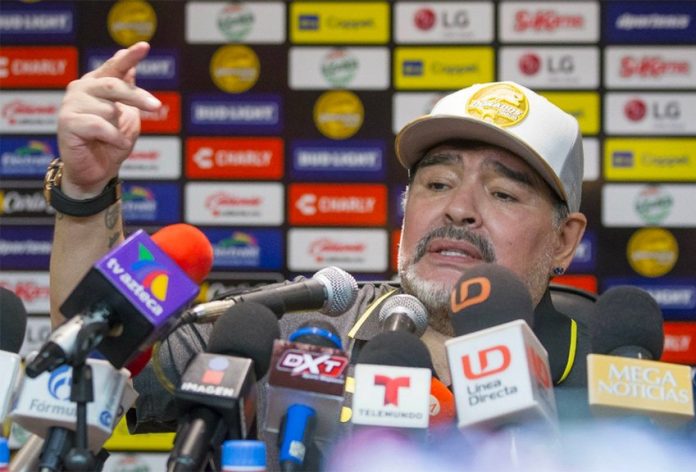 Soccer legend Diego Maradona speaks at a press conference in Culiacán.