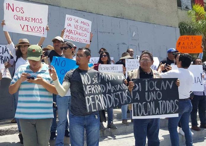 Reporter's assassination triggered a march by journalists Saturday in Chiapas.