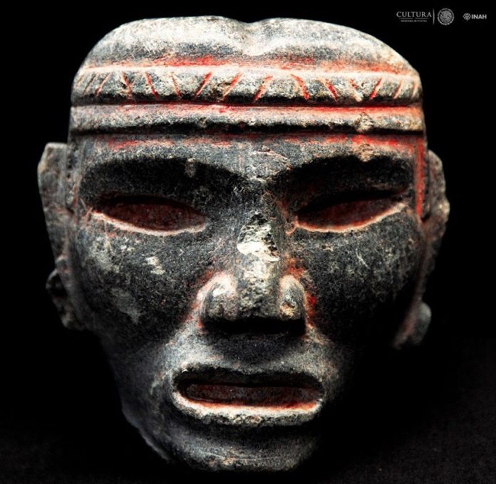 A Mayan green stone figure found by archaeologists.
