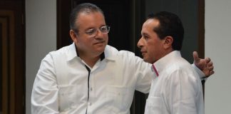Capella, left, and Governor González.