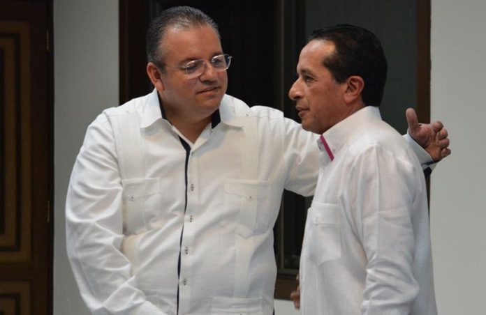 Capella, left, and Governor González.