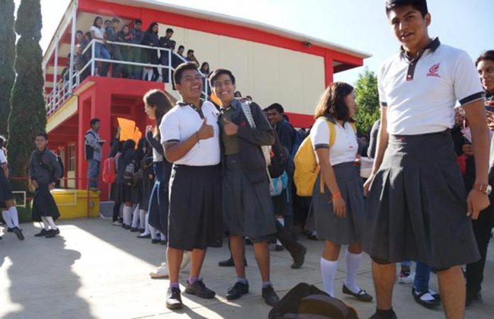 Male students in skirts yesterday at Oaxaca school.
