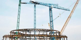 Control tower rises at the new airport.