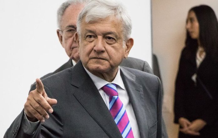 AMLO, also known as the 'Tropical Messiah,' defends airport decision.