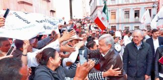 AMLO's fans give him a warm welcome to Zacatecas.