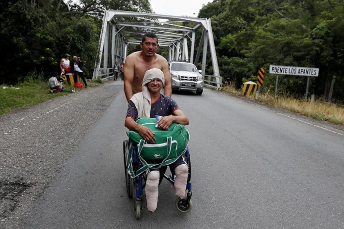 Wheelchair-bound migrant lost his legs the last time he attempted to enter the US