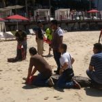 Crocodile is restrained on PV beach.