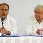 Governor Astudillo, left, and AMLO meet in Guerrero.