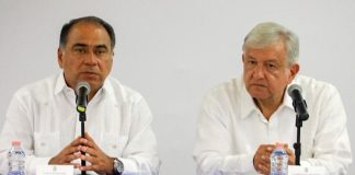 Governor Astudillo, left, and AMLO meet in Guerrero.